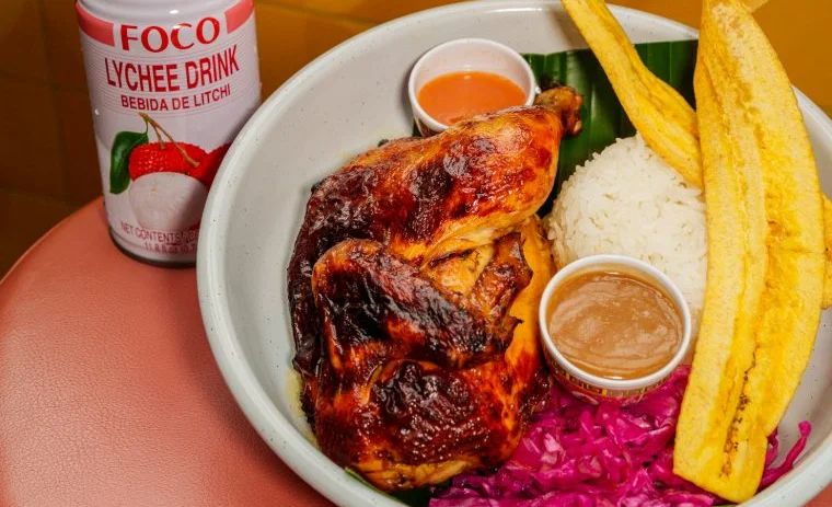 Peruvian pollo a la brasa with sides and a lychee drink