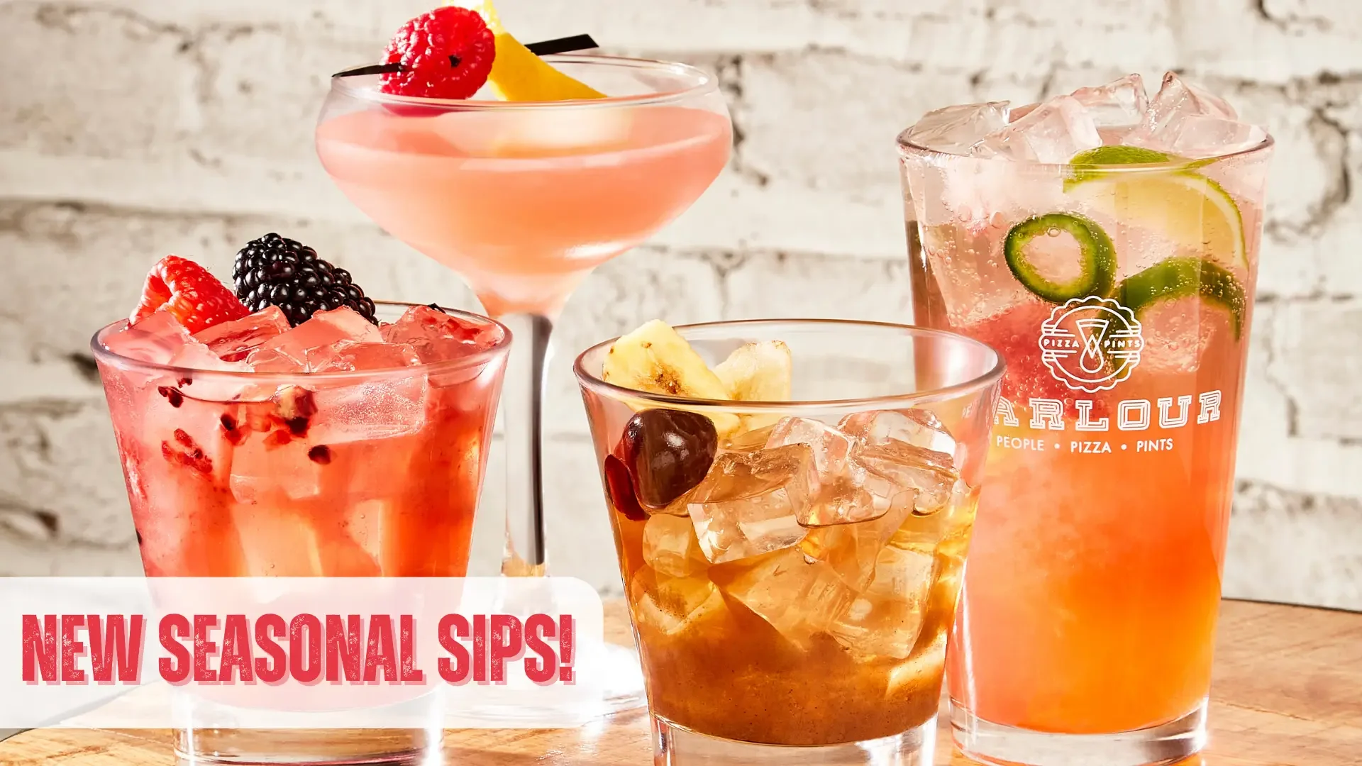 Colorful seasonal cocktails on a wooden table