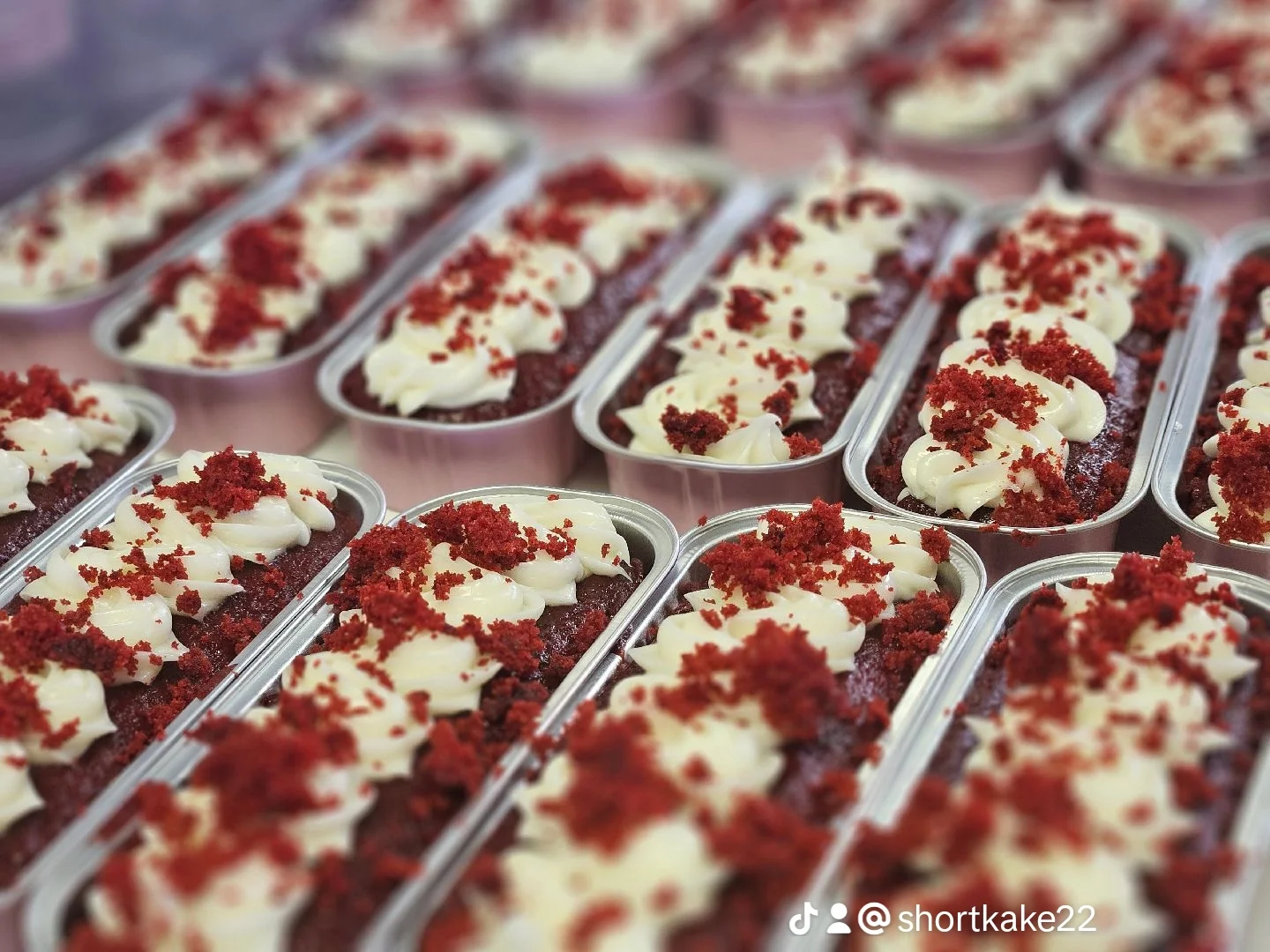 Red velvet cake with cream cheese frosting in individual servings