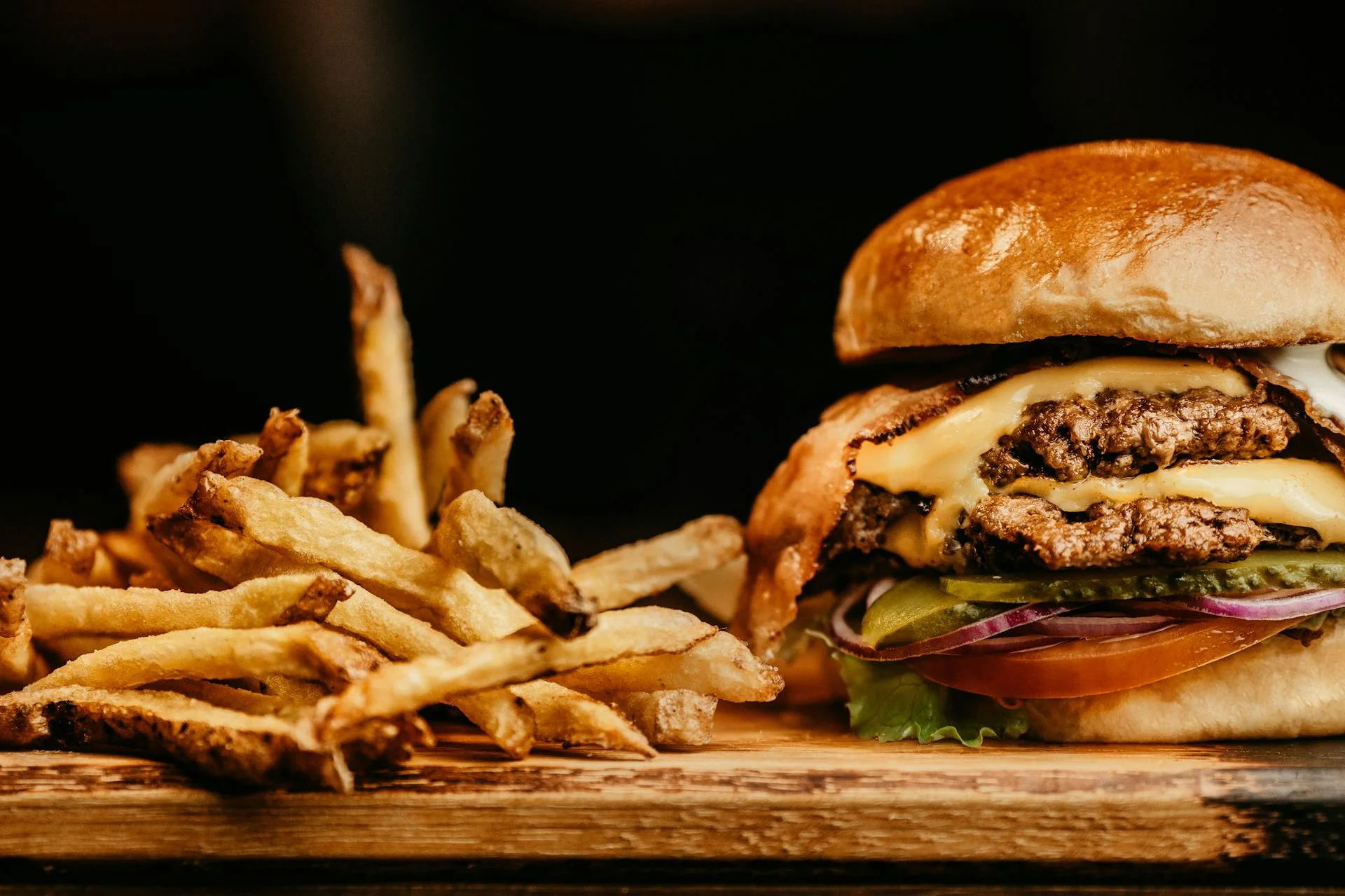 Juicy cheeseburger with crispy fries