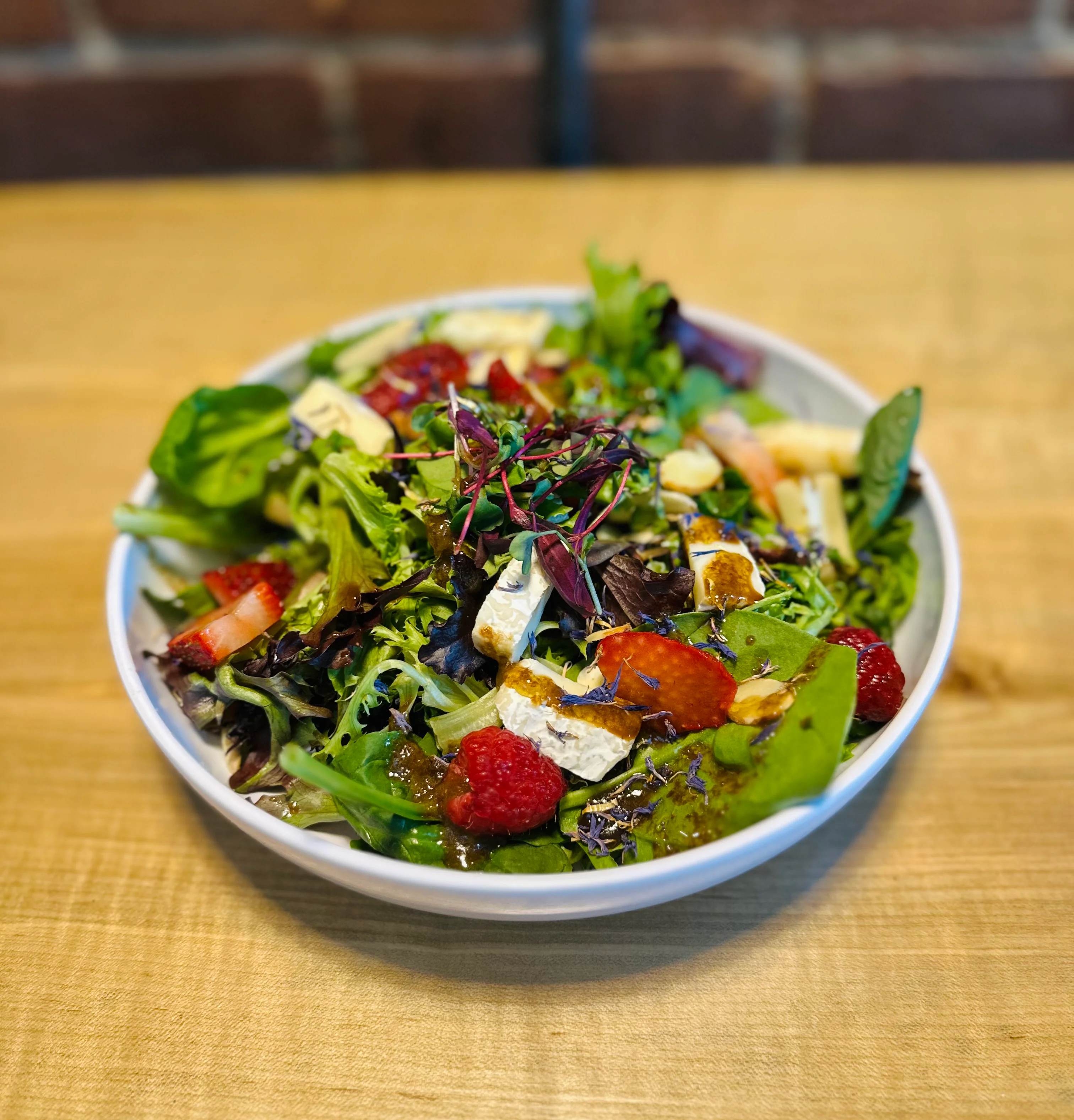 Fresh garden salad with mixed greens and berries