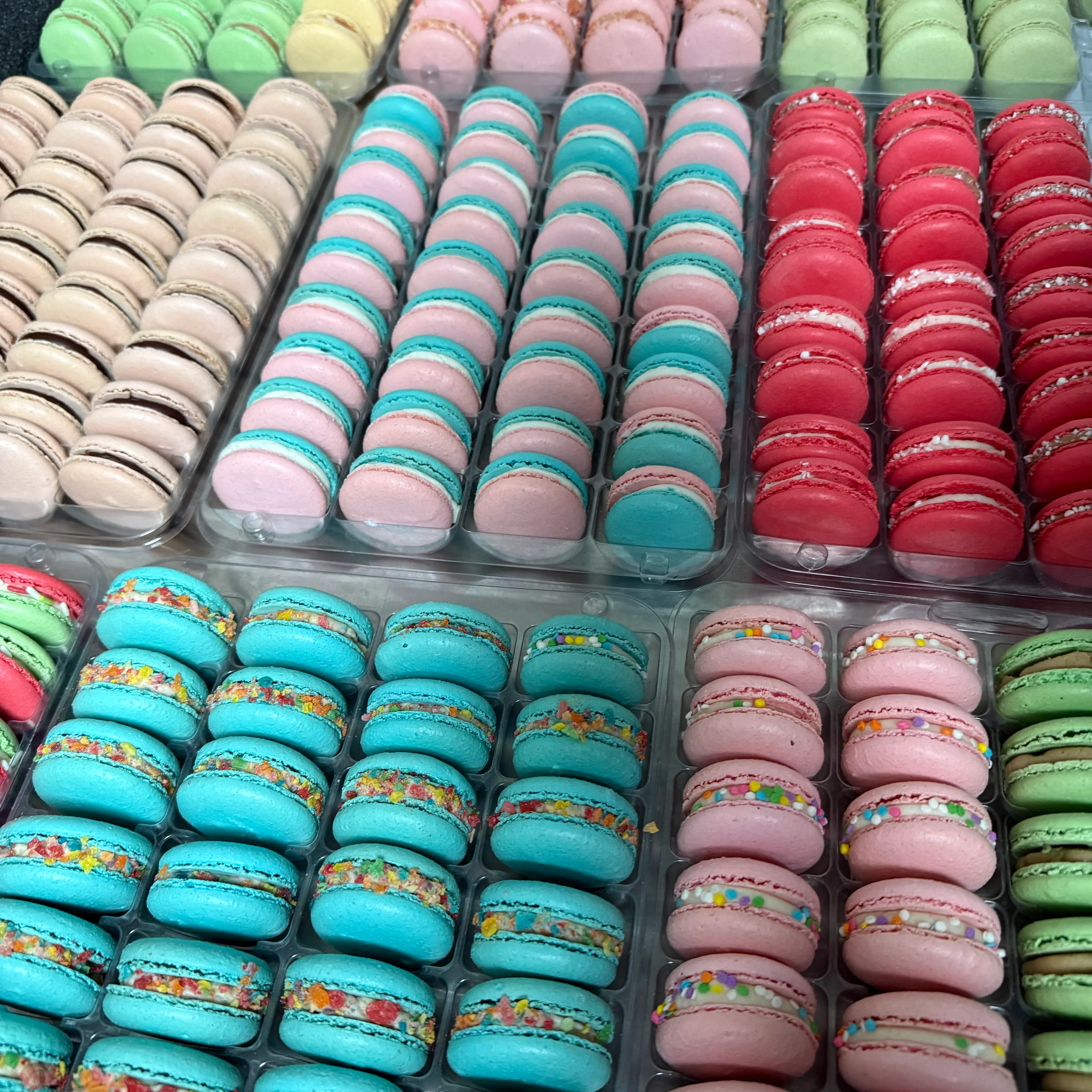 Colorful assortment of French macarons in various flavors