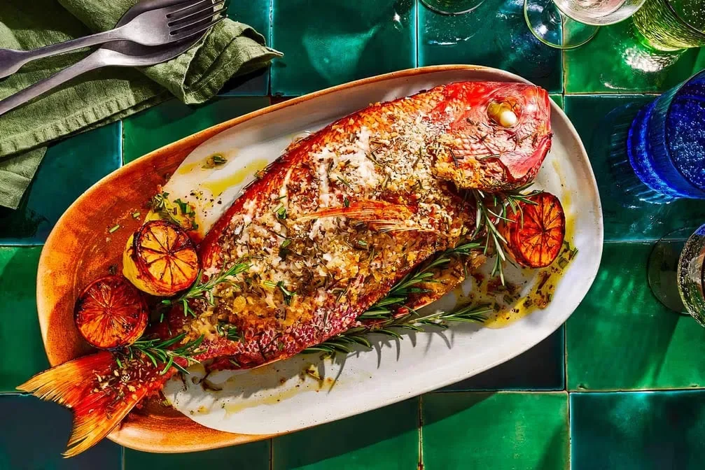 Baked whole red snapper with herbs and citrus