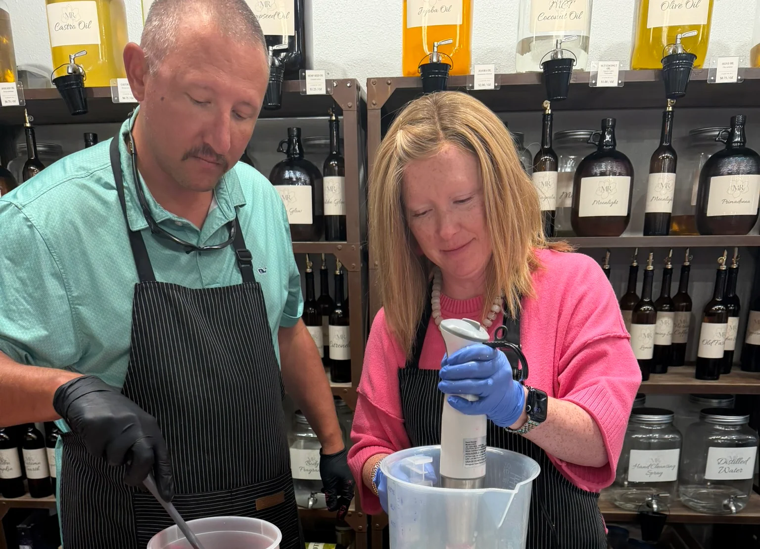 Kajay and Craig making Grace Under Fire products together at Magnolia Ritual