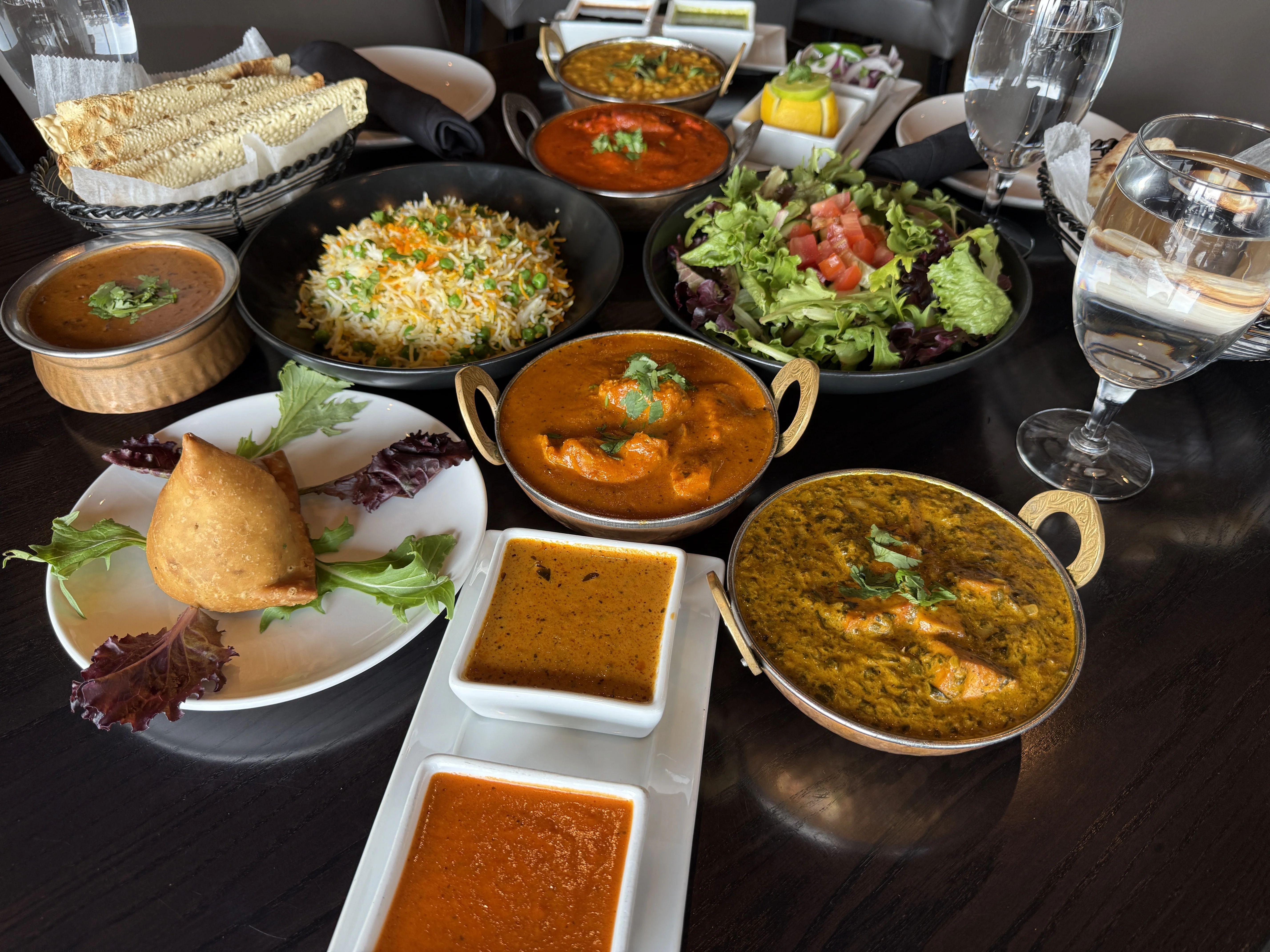 Assorted Indian dishes including biryani and curry