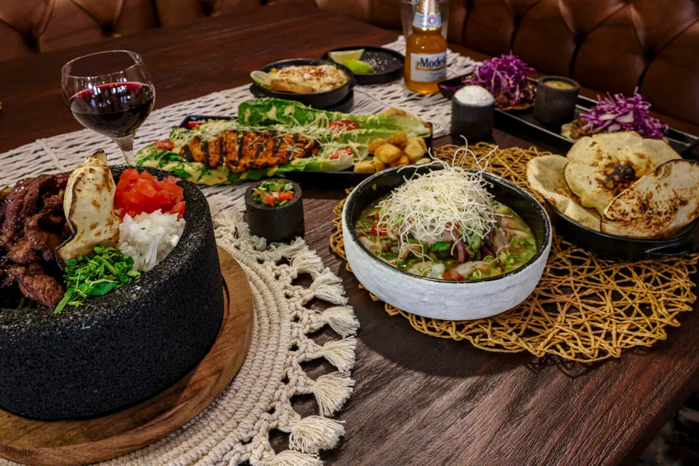 Sizzling Mexican fajitas served in a stone bowl