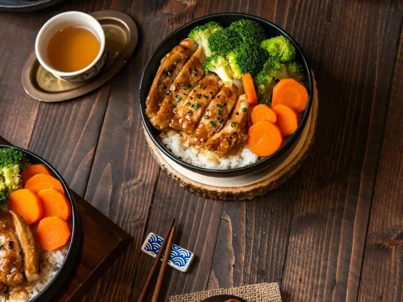 Japanese teriyaki chicken rice bowl with vegetables