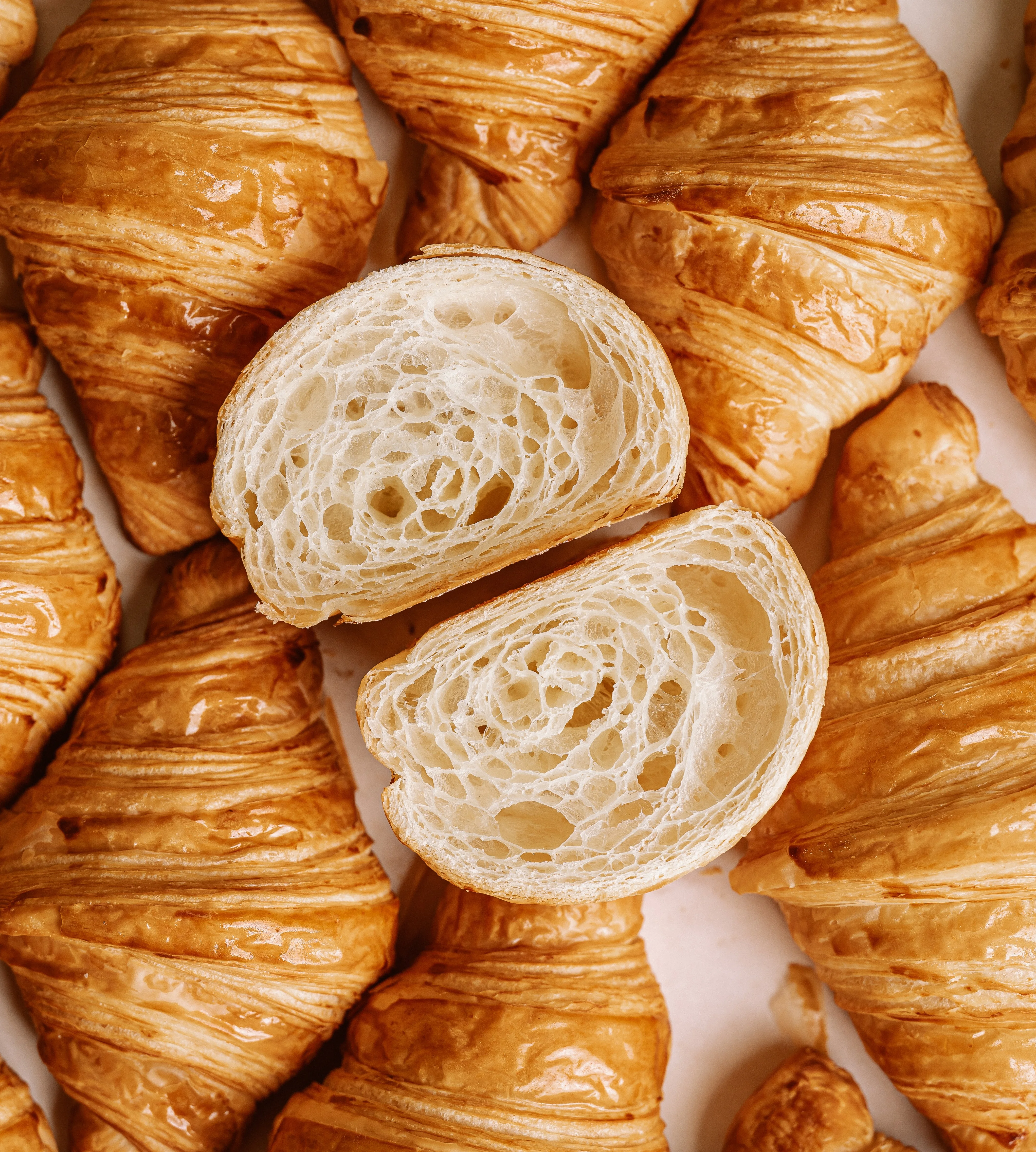 Freshly baked French croissants with flaky layers