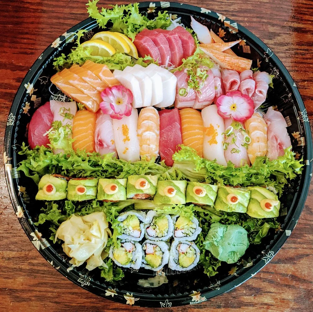 Assorted Japanese sushi platter with fresh sashimi and rolls
