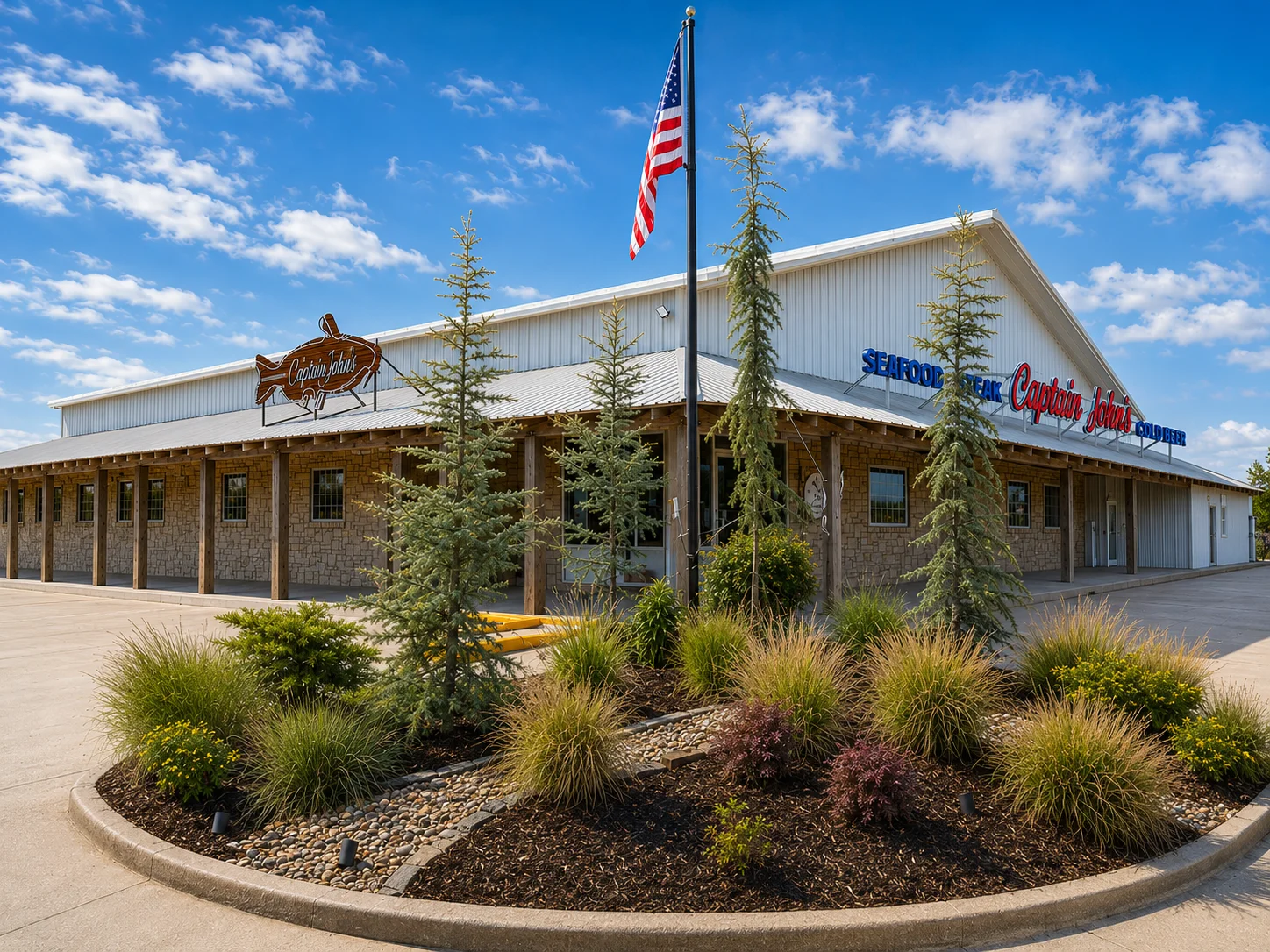 Exterior view of Captain John's seafood restaurant with landscaping and American flag