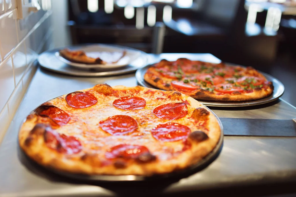 Pepperoni and Margherita pizzas