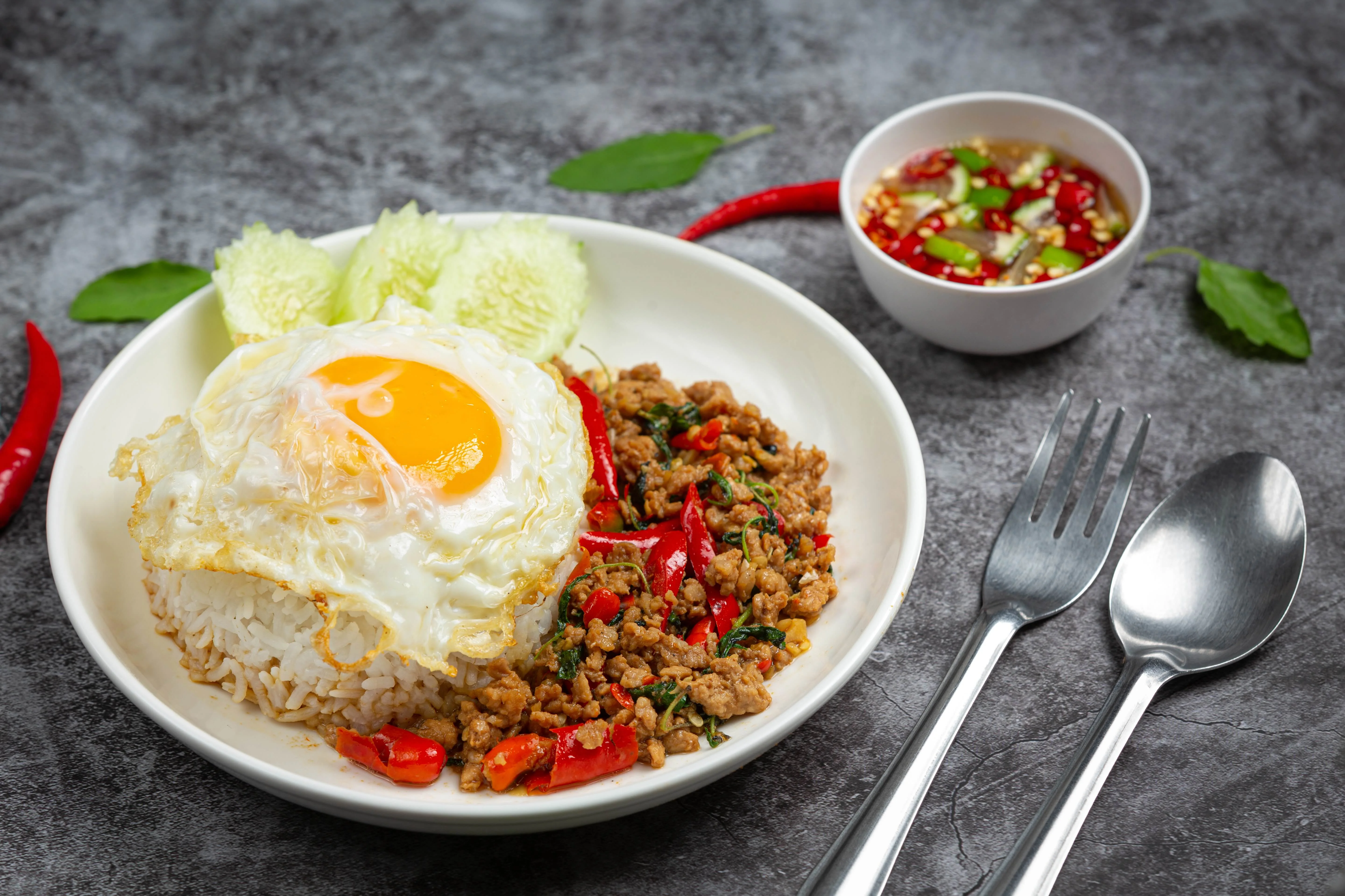 Thai basil stir-fry with rice and fried egg