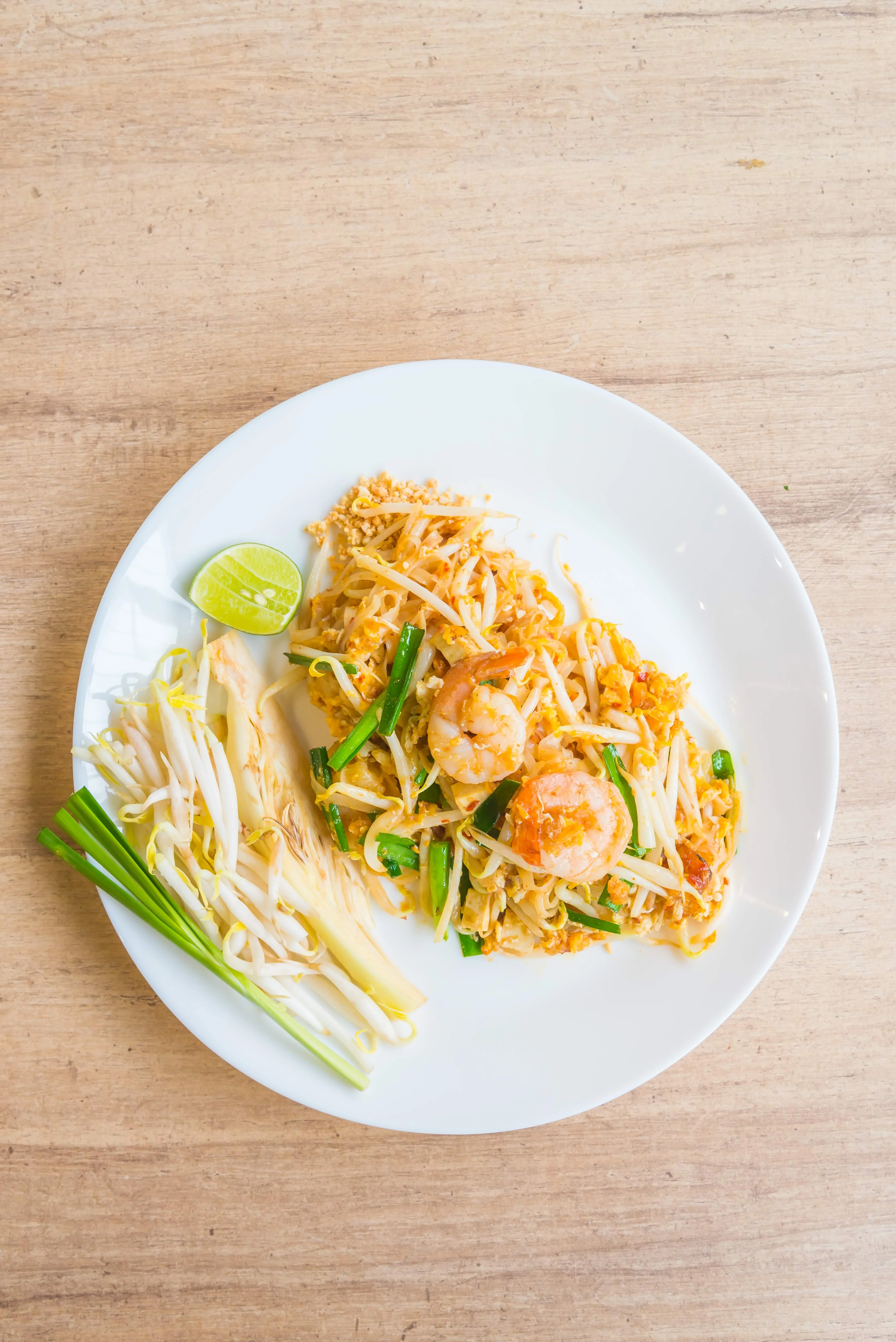 Plate of Pad Thai with shrimp and bean sprouts