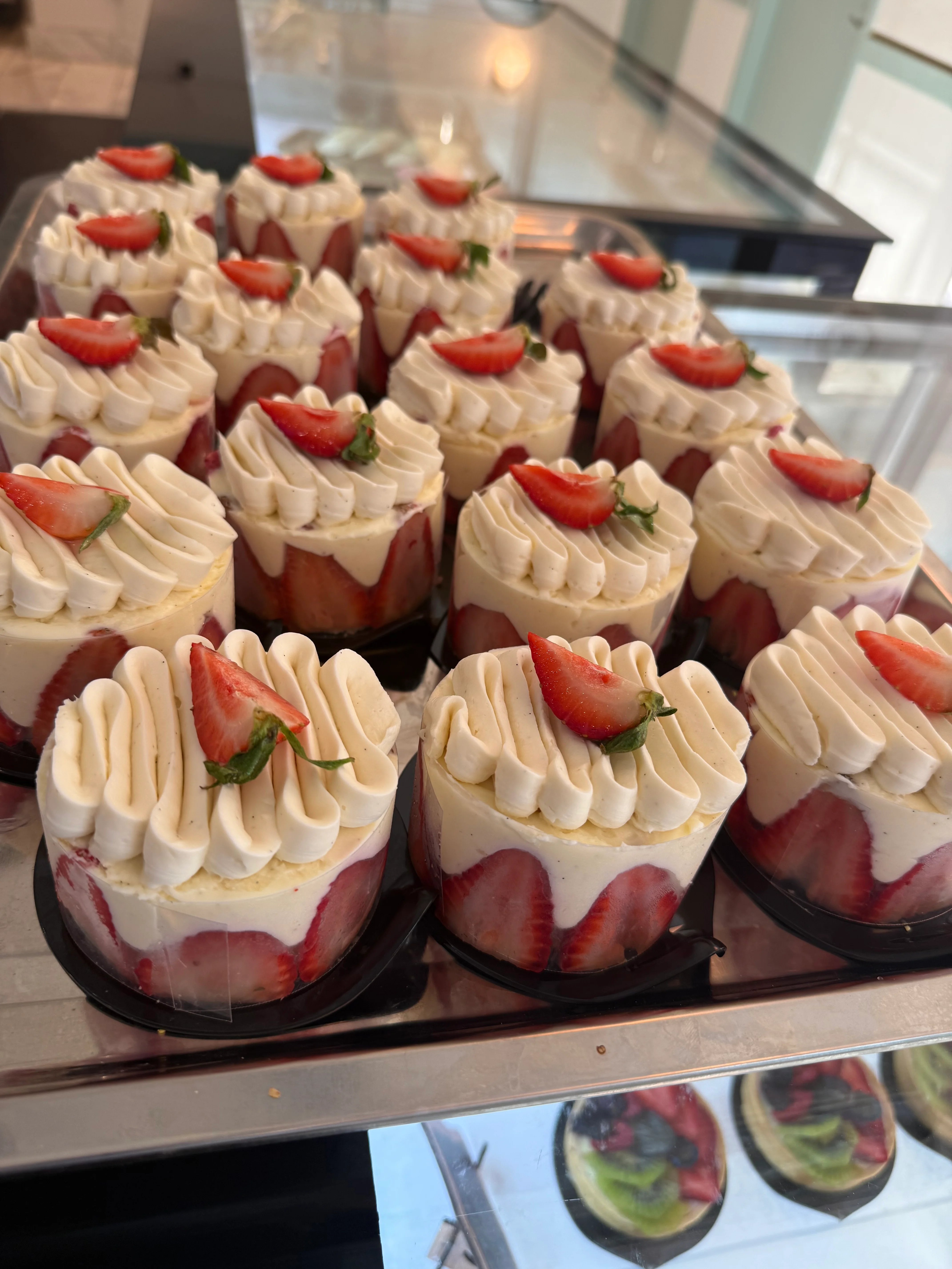 Strawberry mousse cups with whipped cream