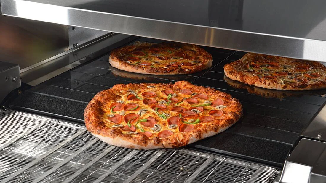 Freshly baked pepperoni pizza from a commercial oven