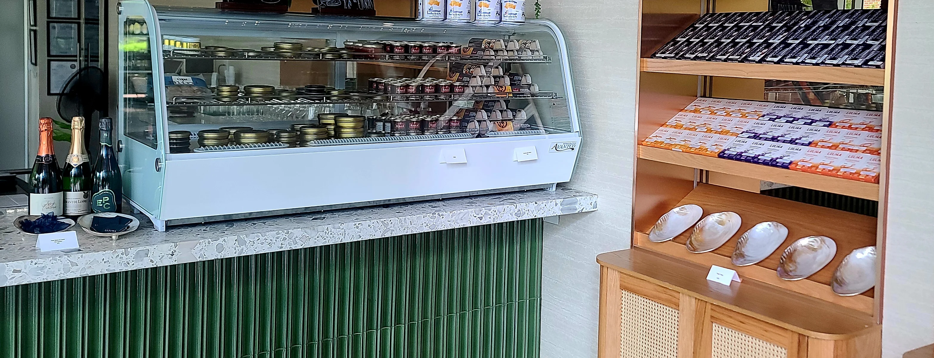 Elegant display of gourmet caviar and fine wines in a chic restaurant