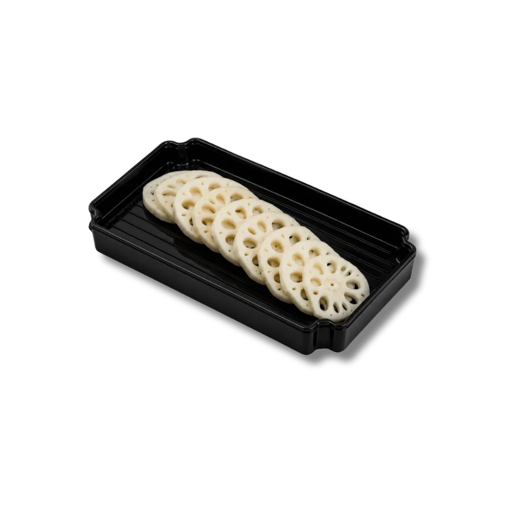 Sliced lotus root arranged in a black container.