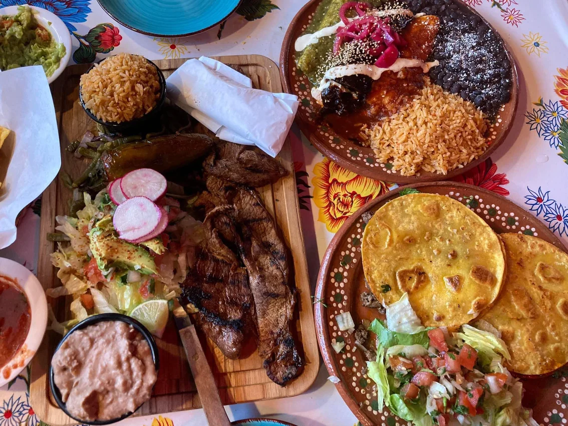 Authentic Mexican platter with tacos and grilled meats