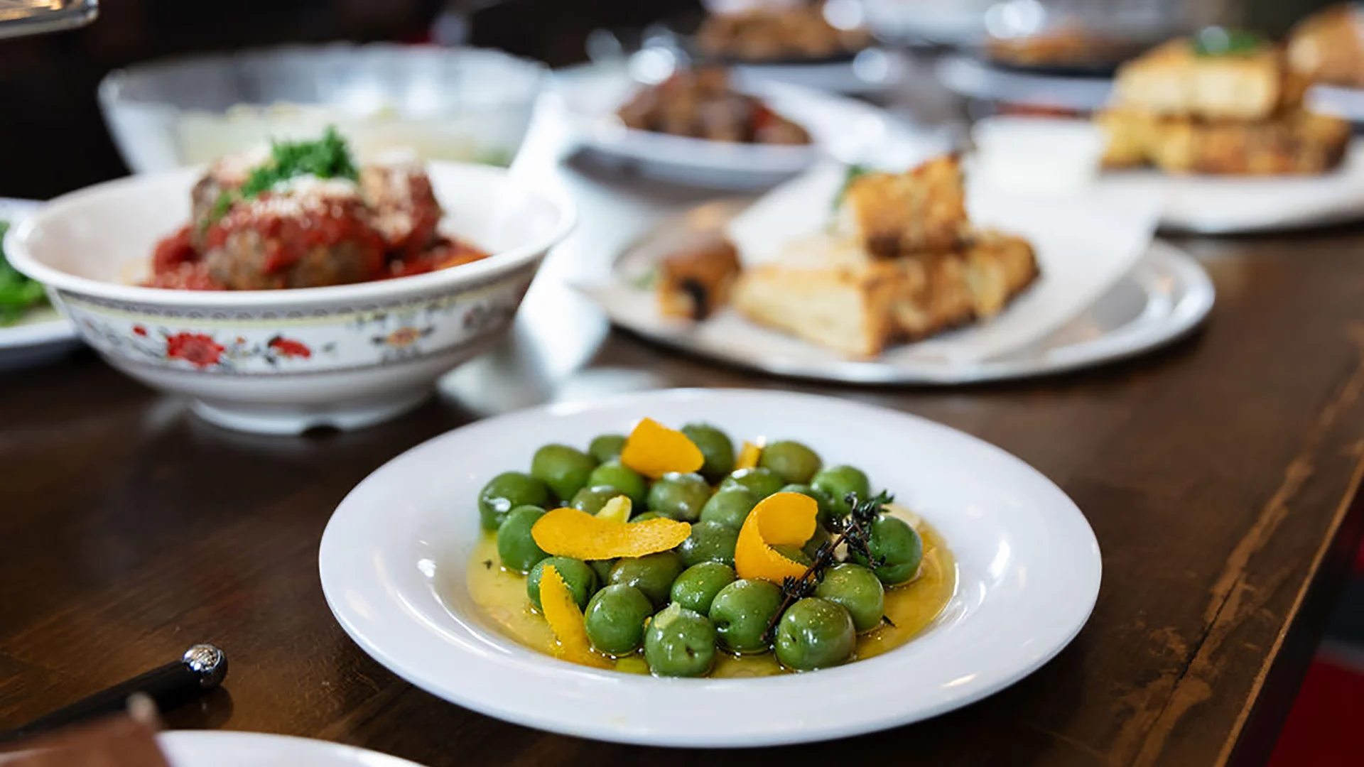 Mediterranean green olives with citrus and herbs