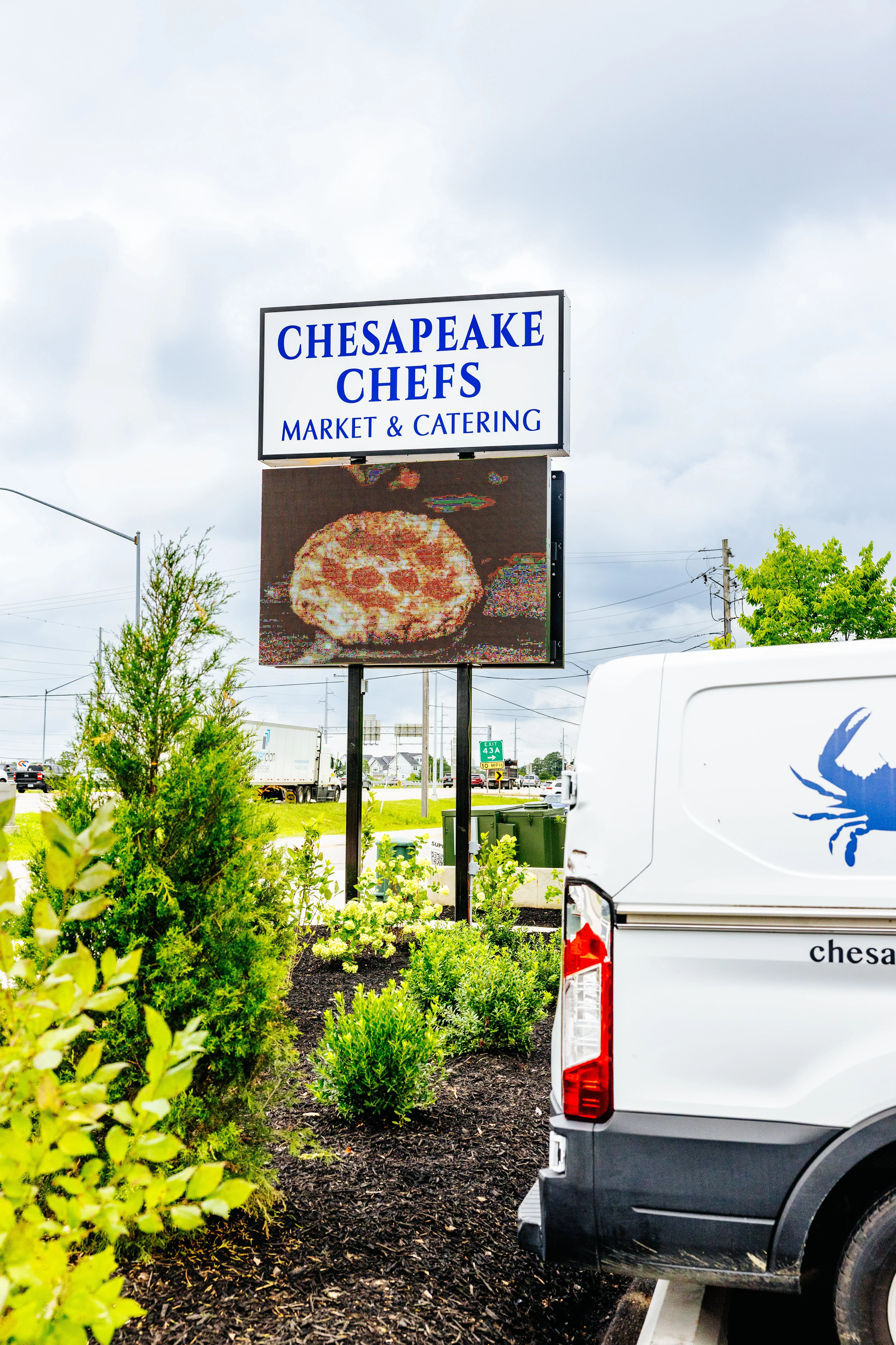 Chesapeake Chefs market sign featuring pizza