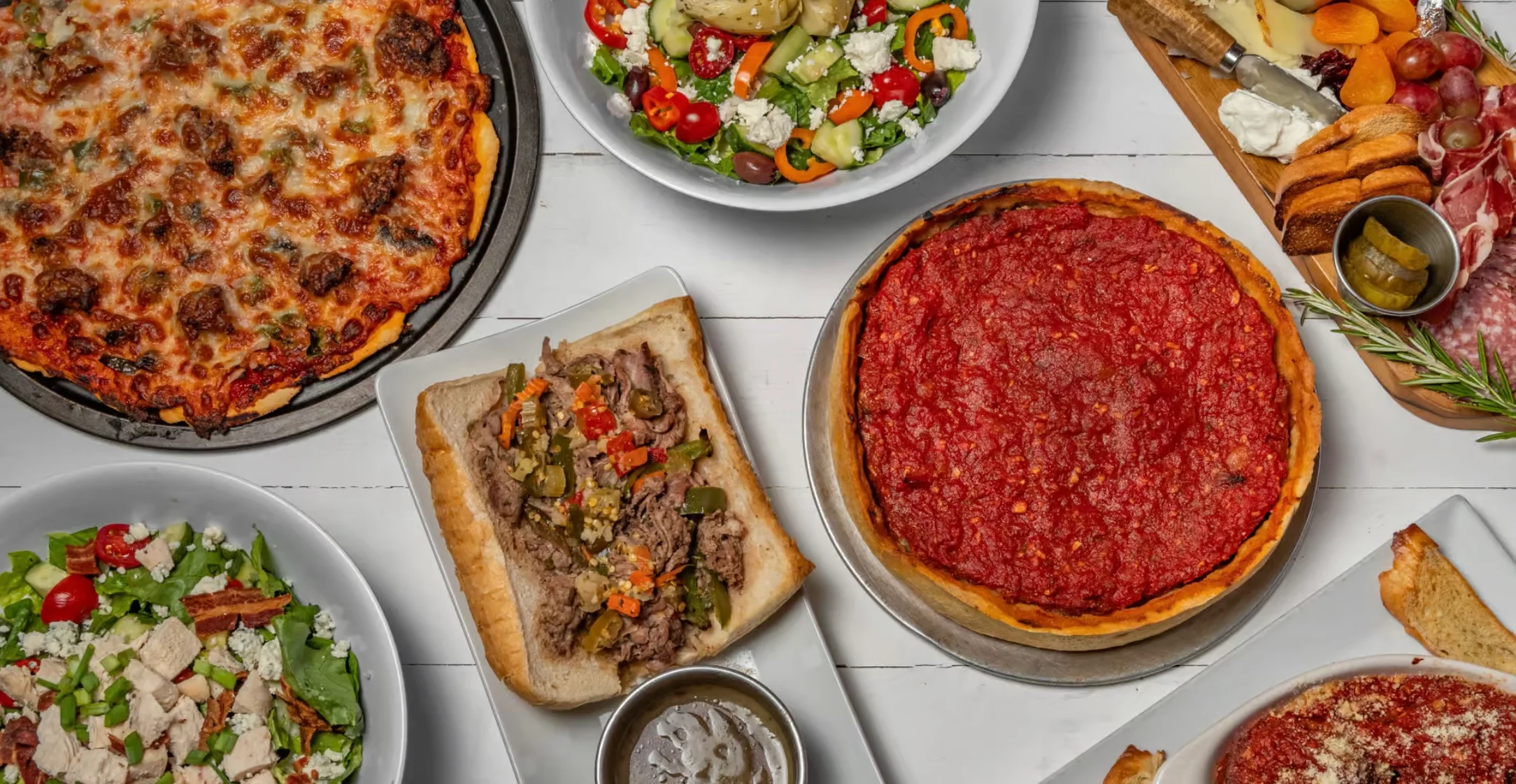 Chicago deep-dish pizza with Italian beef sandwich and fresh salad