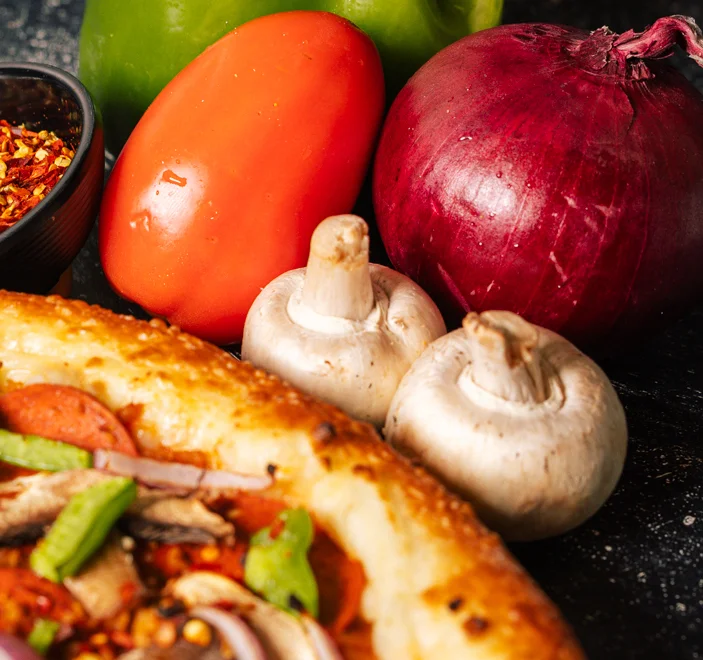 Delicious vegetarian pizza with fresh toppings and spices