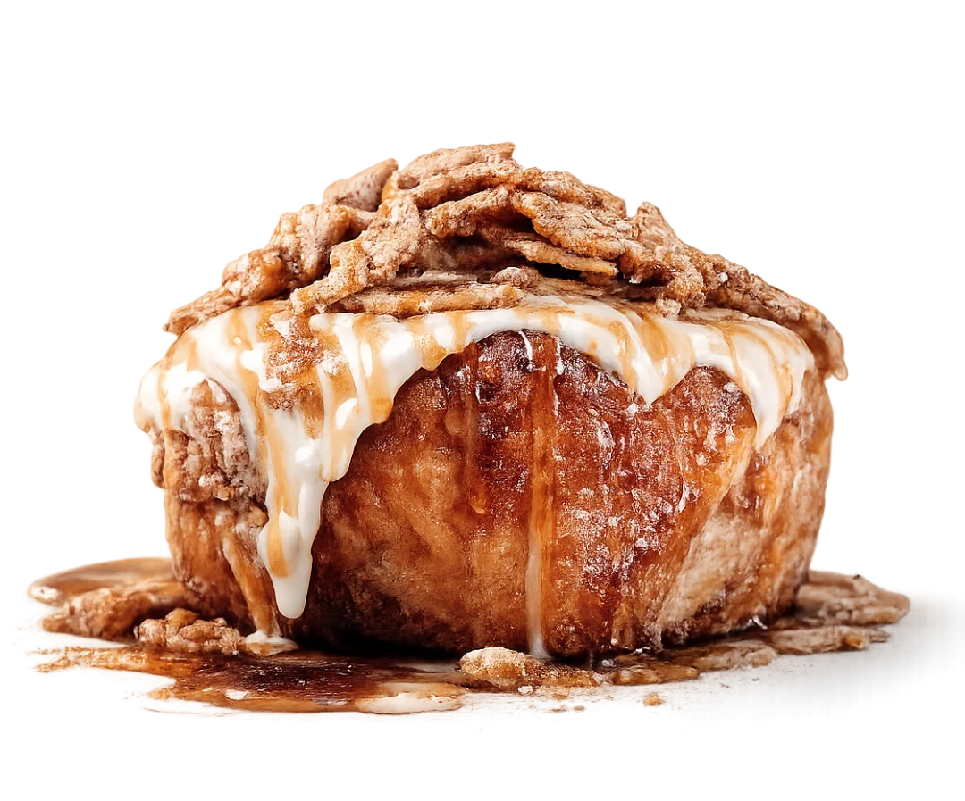 Decadent cinnamon roll topped with icing and crunchy cereal
