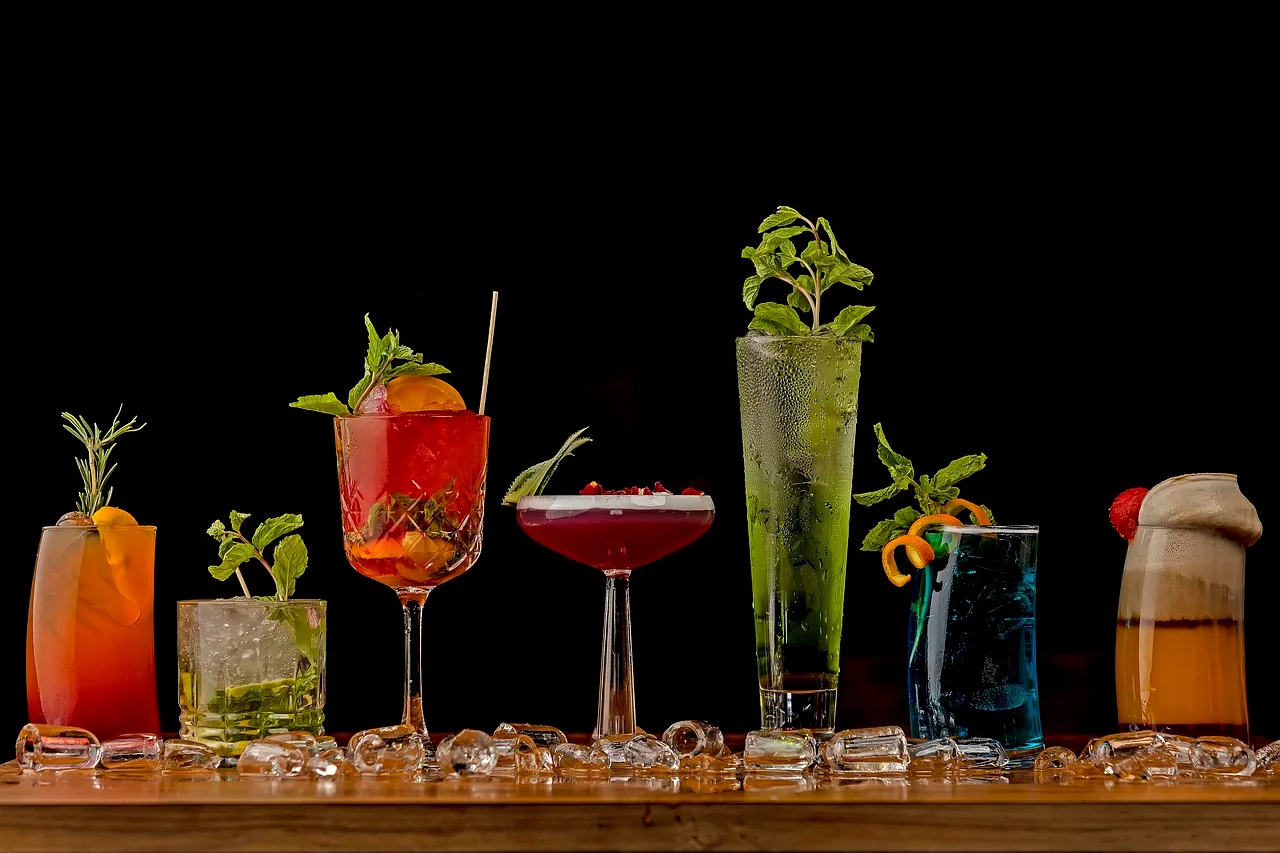 Colorful cocktails displayed on a bar counter