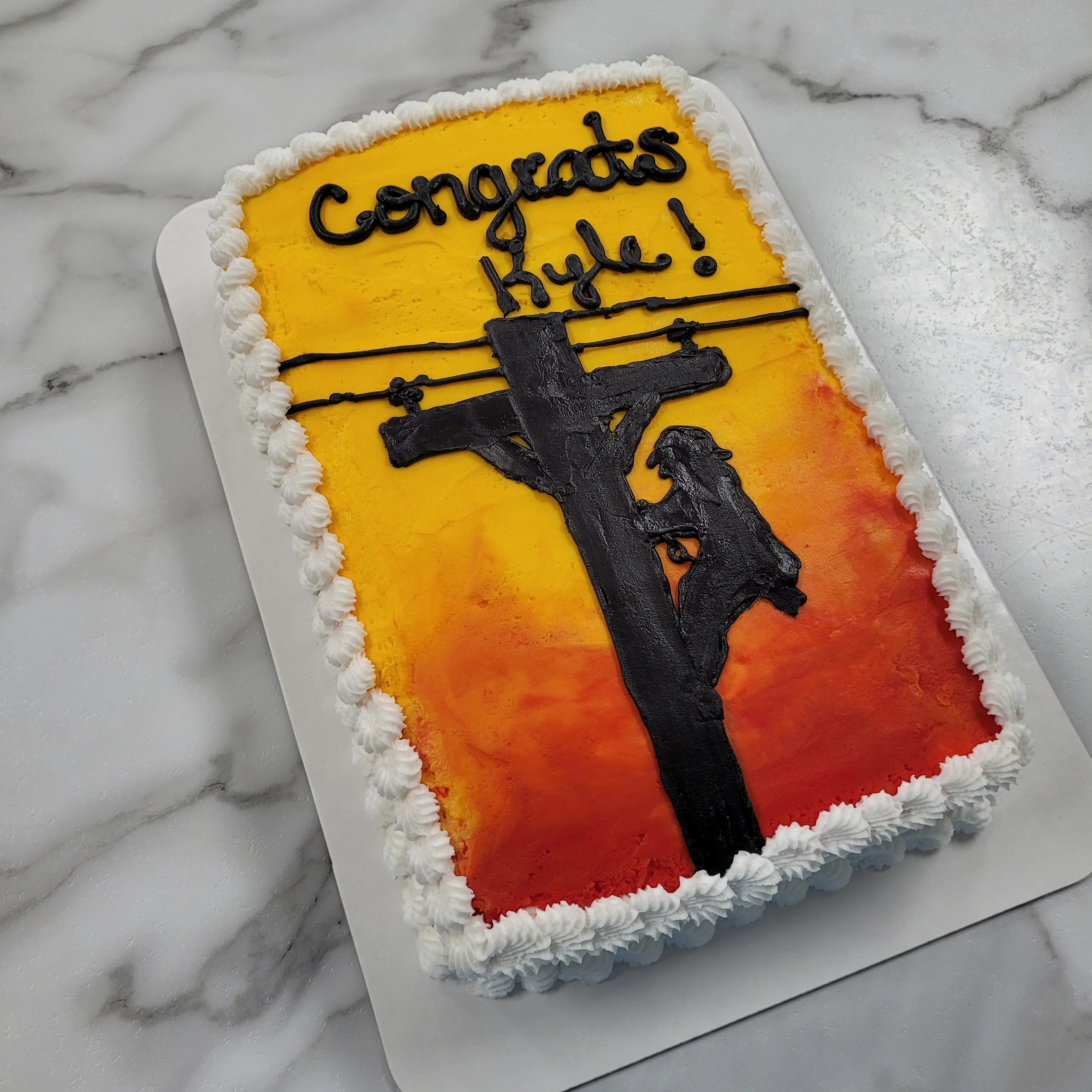 Colorful cake with congratulatory message and artistic design
