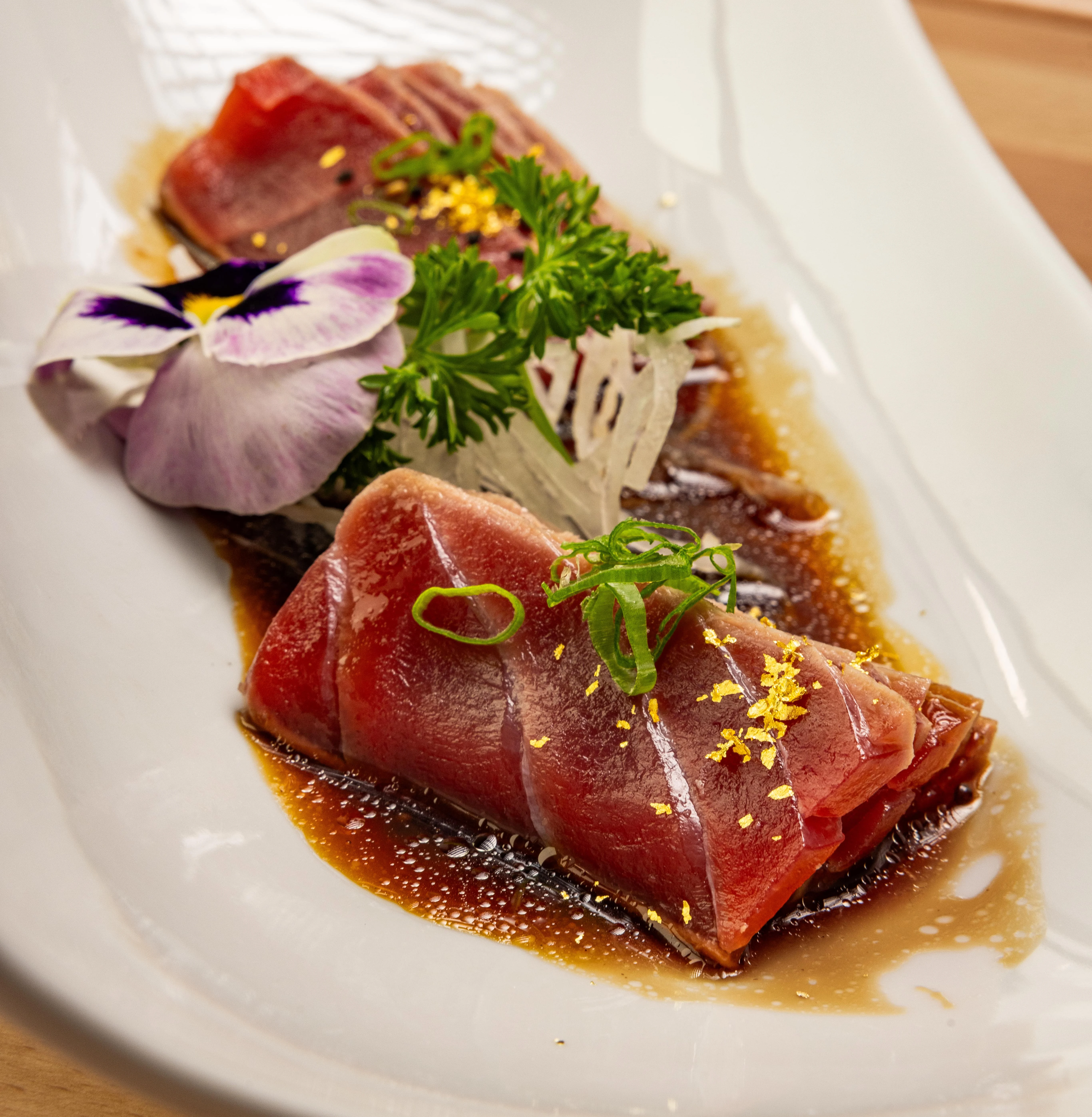 A restaurant chef preparing a dish