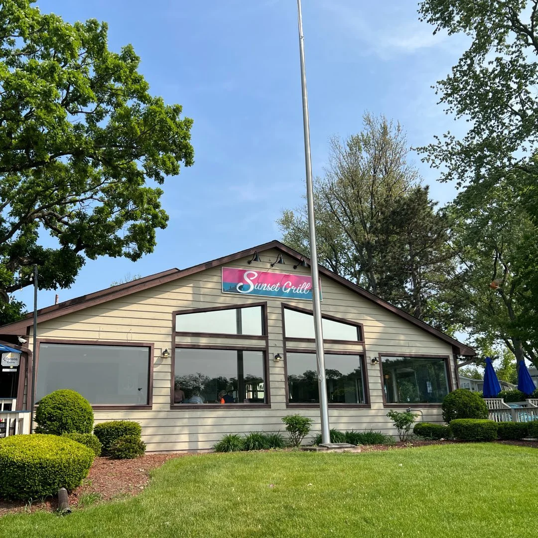 Front of Sunset Grill on Bluff Lake with the flag flying