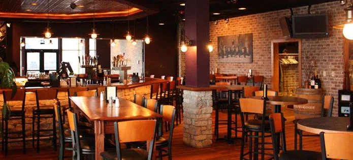 Cozy restaurant interior with warm lighting and wooden furnishings