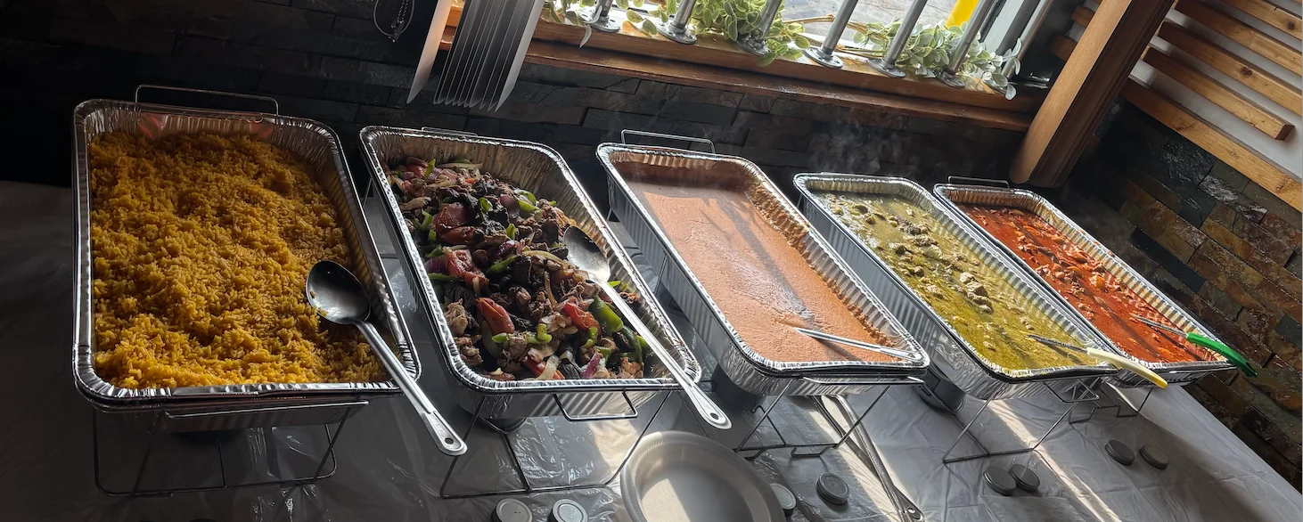 Buffet of Indian curries with fragrant basmati rice and mixed vegetables