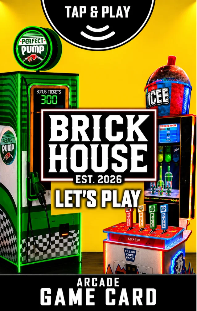 A vibrant arcade game area featuring an interactive game setup and colorful signage encouraging play.