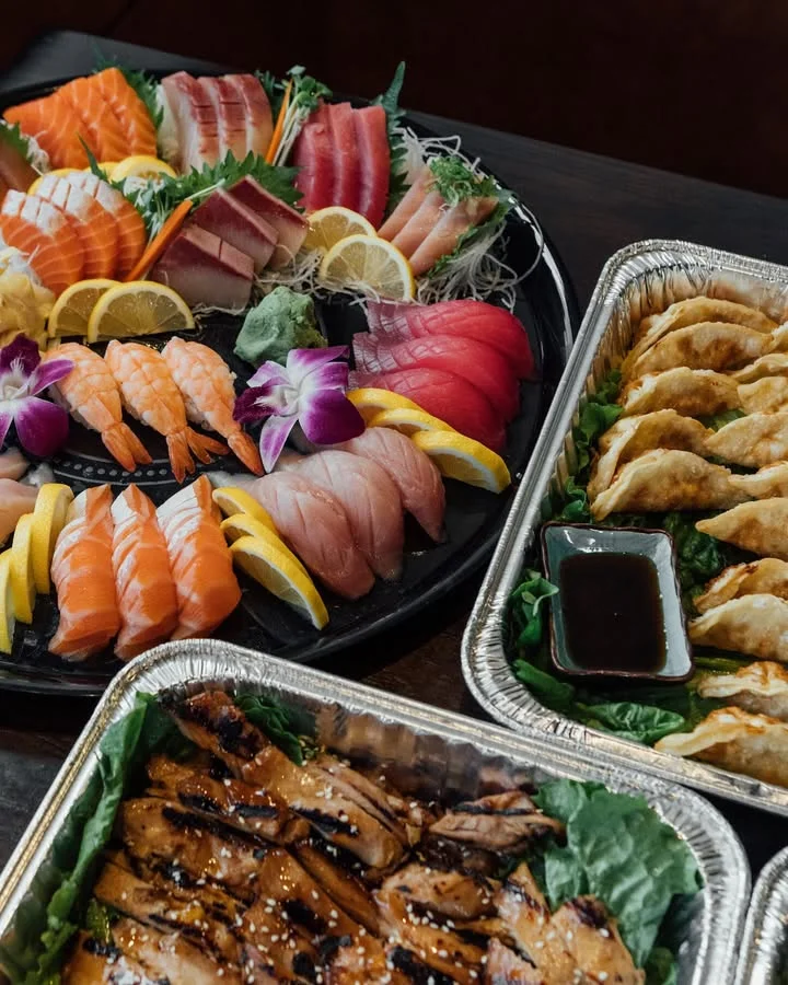 Japanese sushi platter with sashimi and gyoza