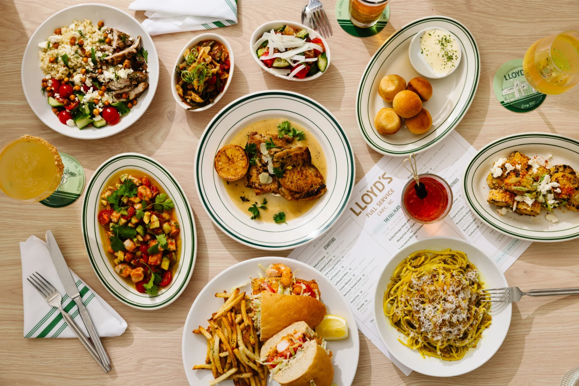 Assorted Mediterranean dishes on a wooden table