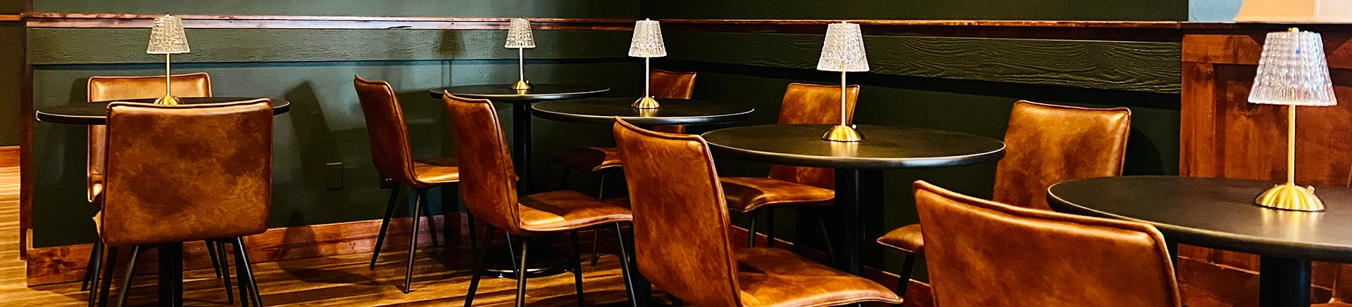 Cozy restaurant interior with stylish seating and warm lighting