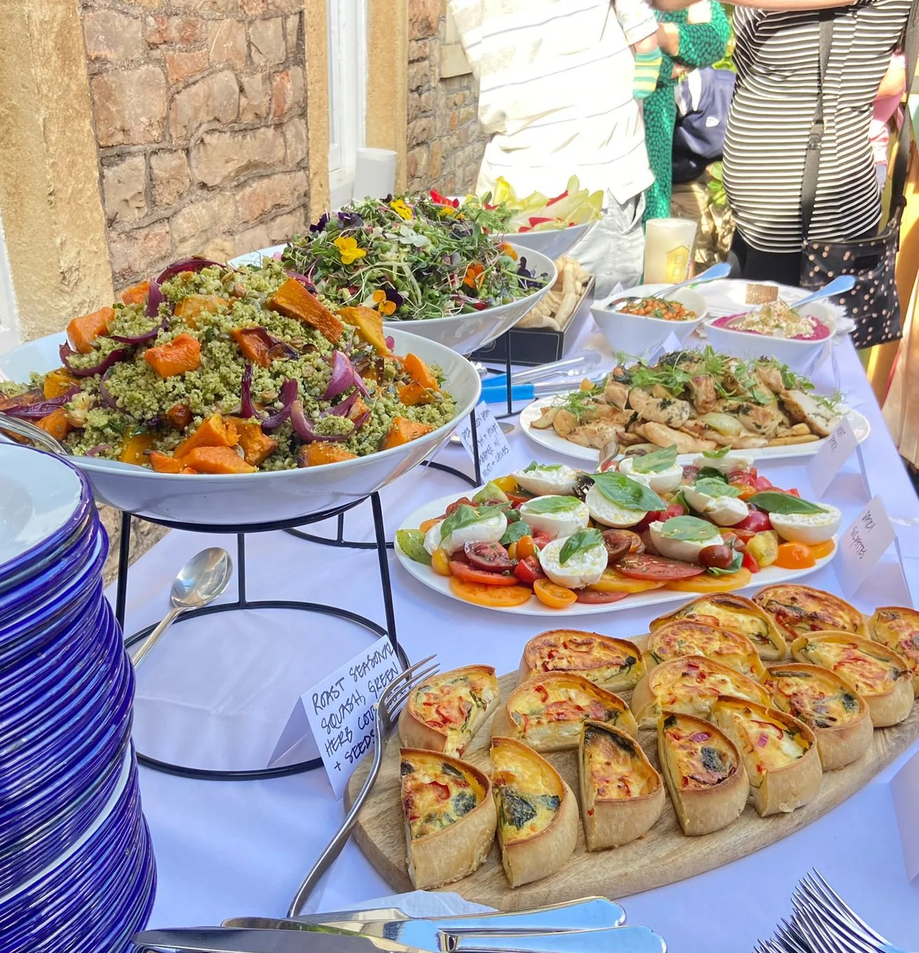Colorful Mediterranean buffet with salads and savory pastries