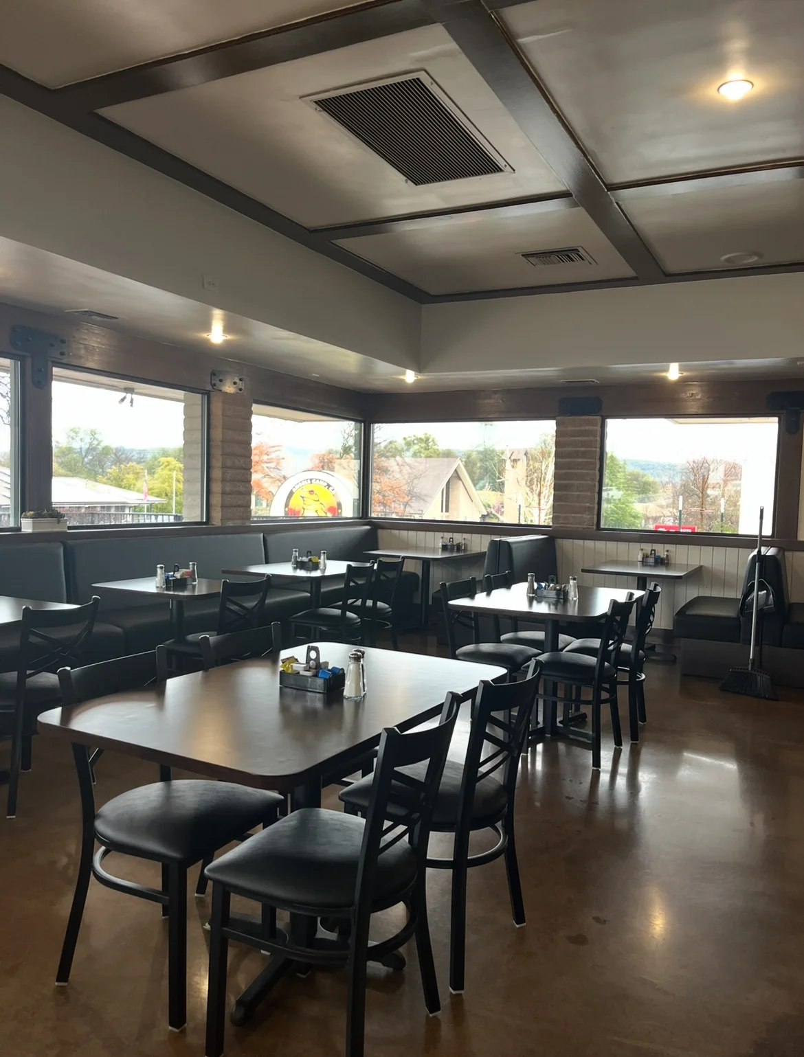 Cozy restaurant interior with modern decor and ample seating