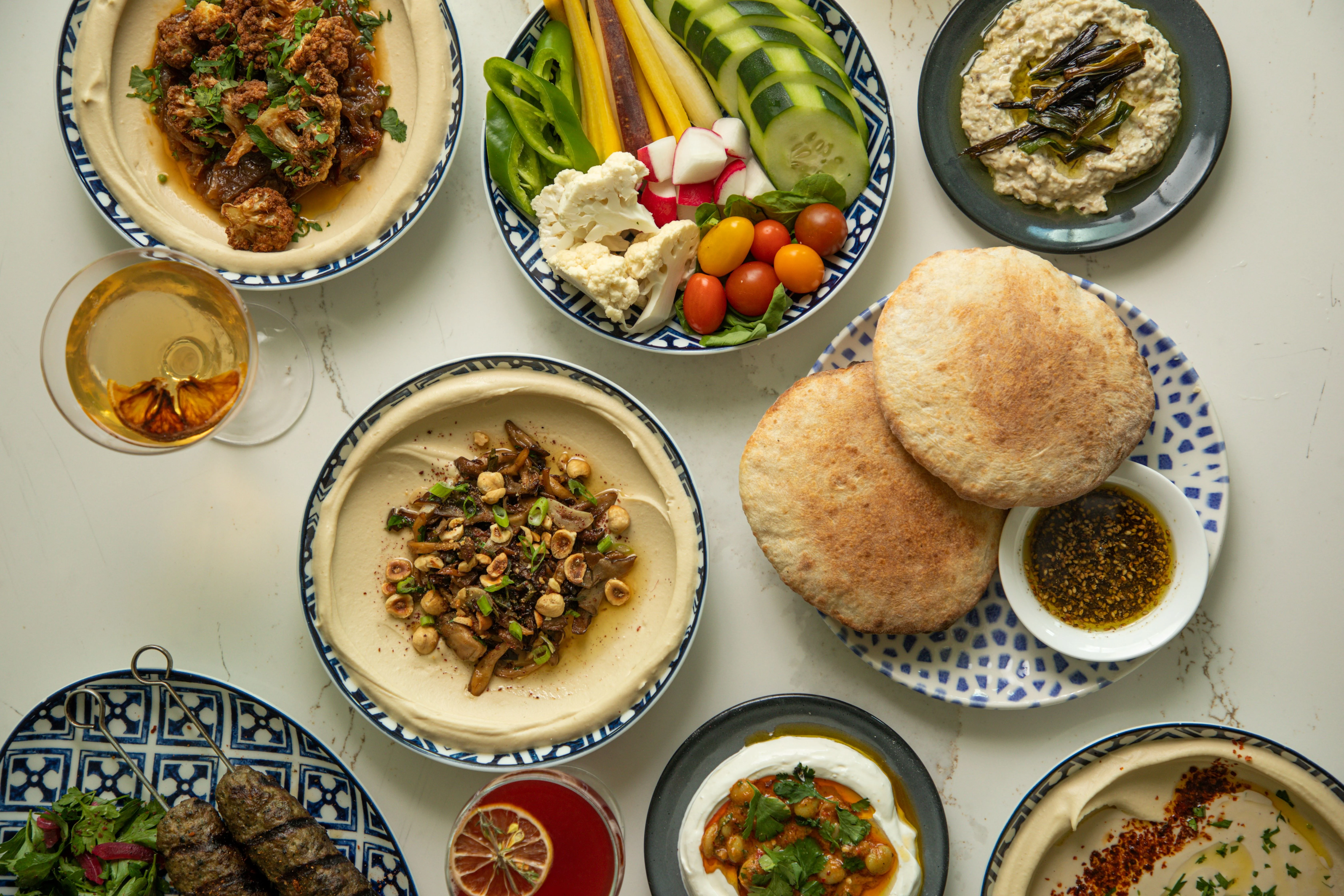 Mediterranean mezze platter with hummus and pita bread