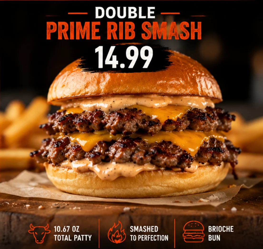 A double prime rib burger featuring two patties, melted cheese, and a creamy sauce on a brioche bun, served with fries.