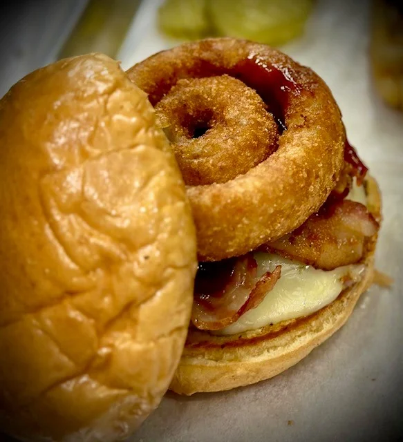 Bacon donut burger with crispy onion ring