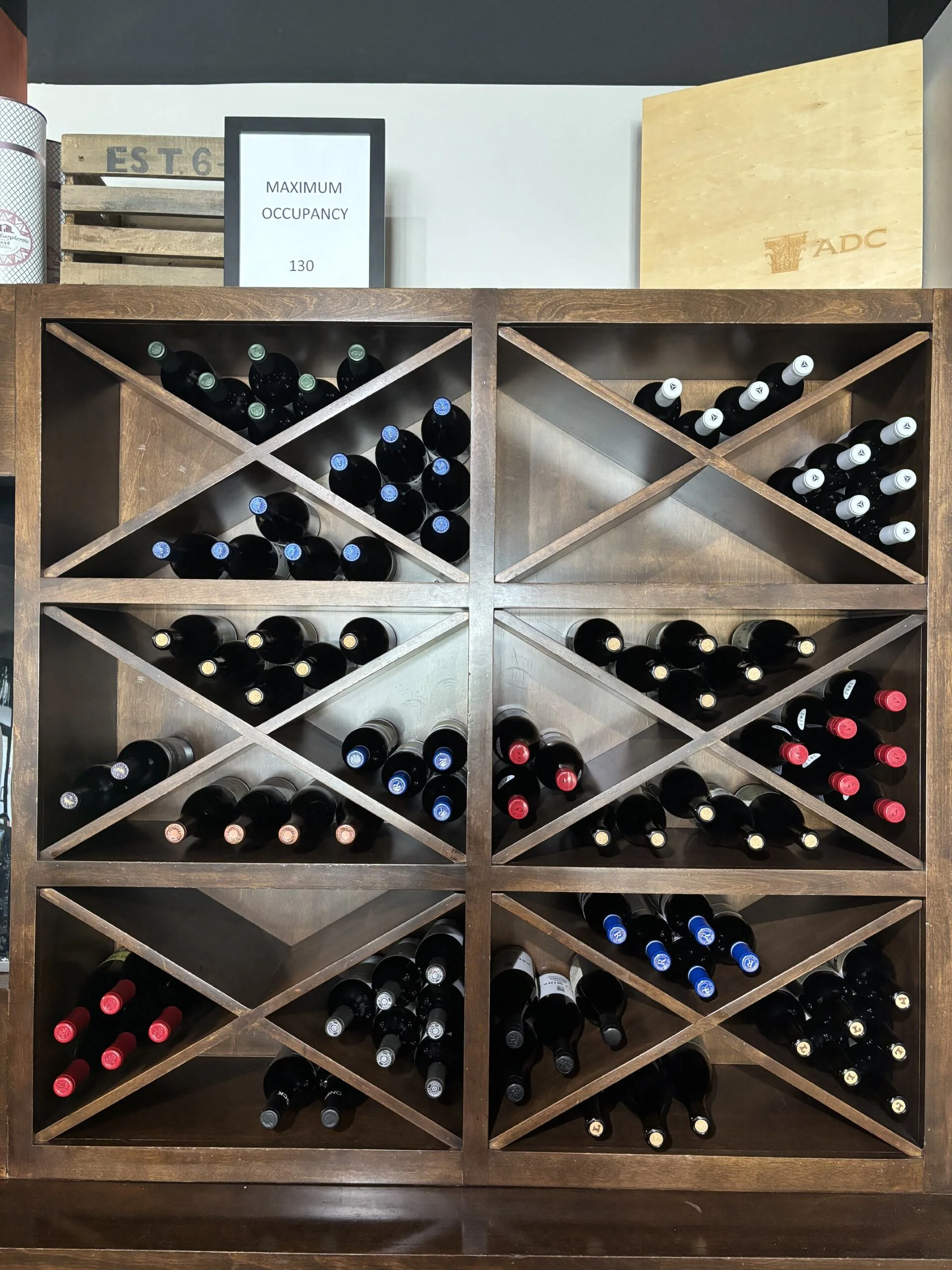 Wine rack display in a modern restaurant interior