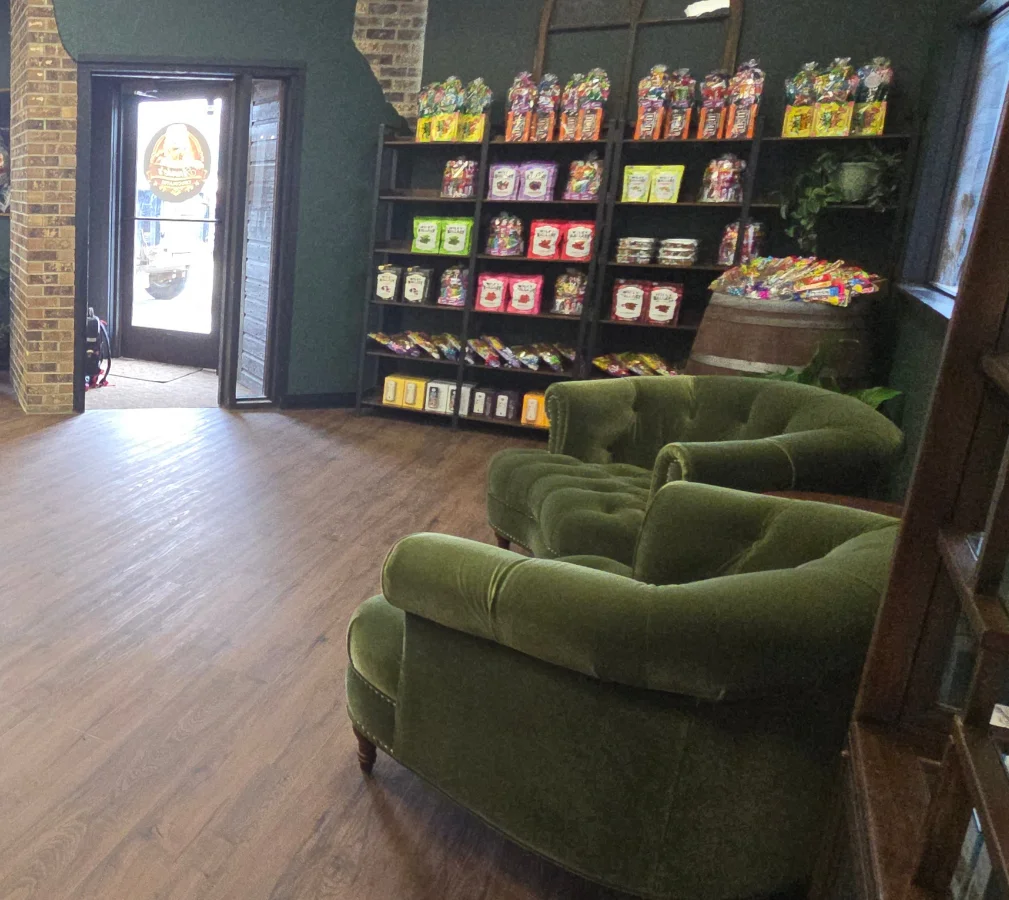 Charming café interior with cozy seating and colorful candy displays