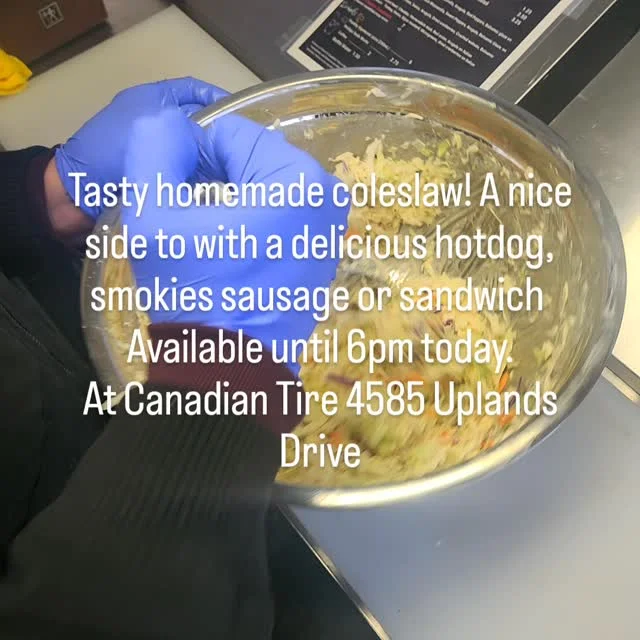 A bowl of coleslaw made with fresh vegetables. The coleslaw is prepared as a side dish suitable for hotdogs or sandwiches.