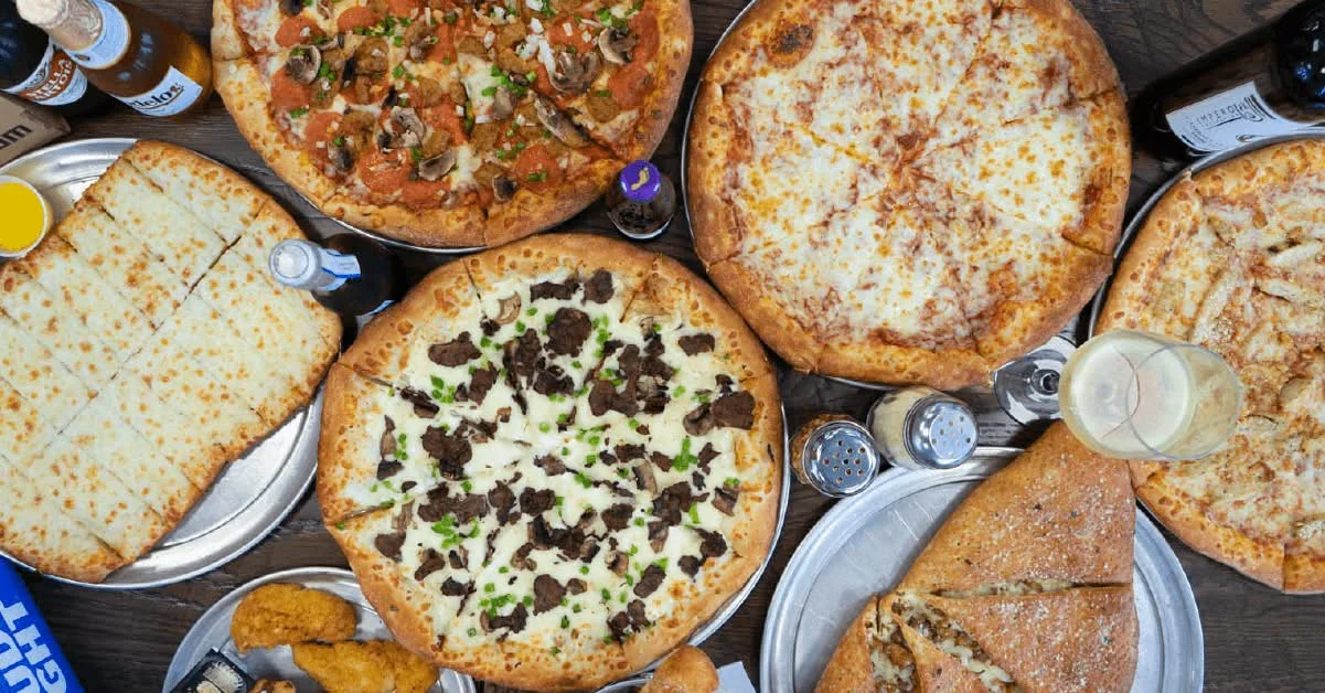 Variety of pizzas including classic cheese and specialty toppings