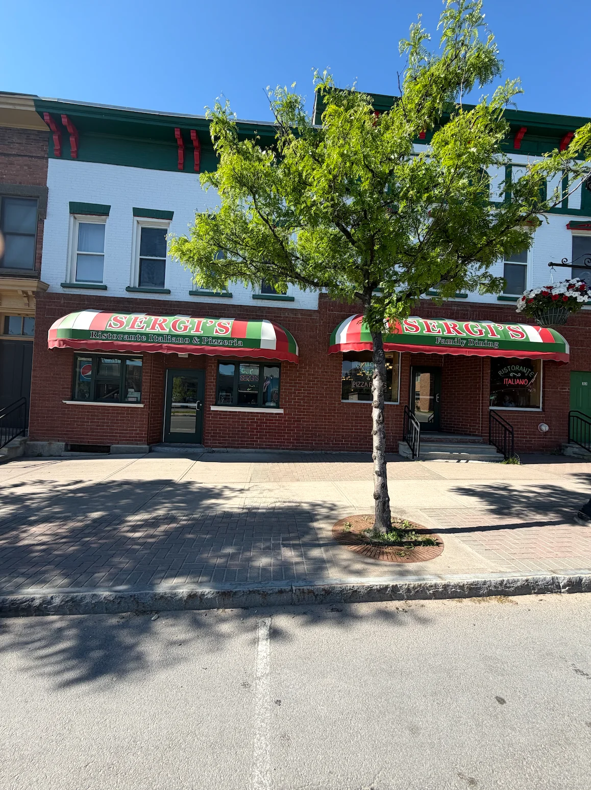 Exterior view of Sergi's Italian restaurant with awnings