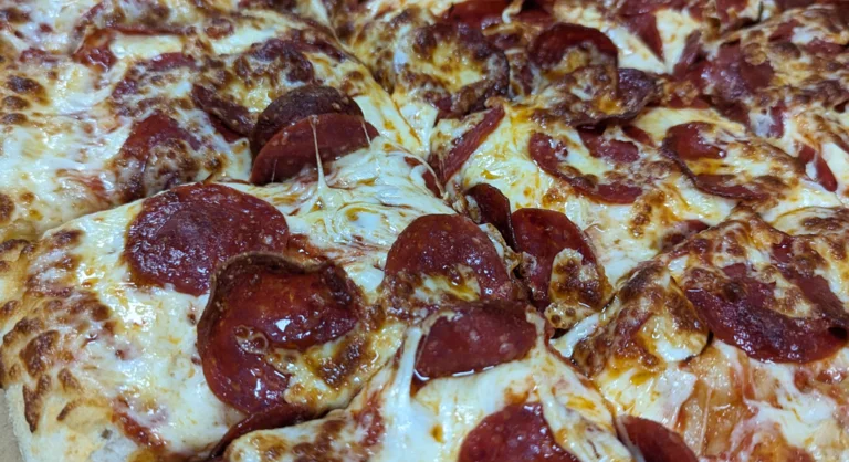Pepperoni pizza with melted cheese and crispy crust