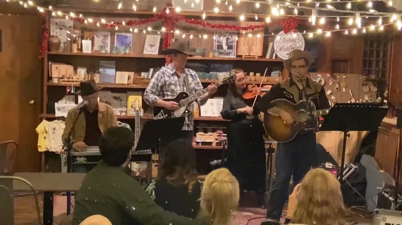 Live country music performance in a cozy restaurant setting