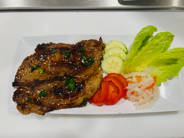 A restaurant chef preparing a dish